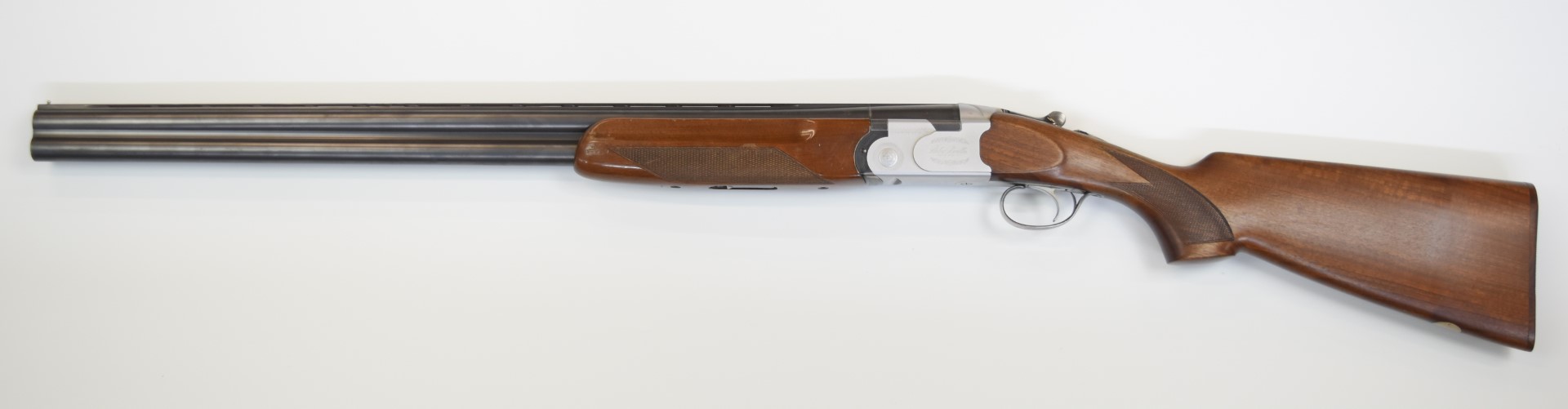 Beretta S685E 12 bore over and under ejector shotgun with engraved lock, underside, trigger guard, - Image 7 of 11