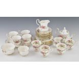 Royal Albert tea ware decorated in the Moss Rose pattern, approximately twenty five pieces