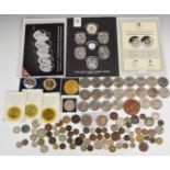 A collection of UK and overseas coinage including halfpenny token, modern crowns, some mixed