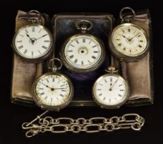 Five silver pocket watches, most with gilt and floral decoration including one in travel stand and