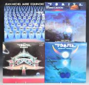 A collection of 26 albums by Vangelis (13), Jean Michel Jarre (5) and Tomita (8)