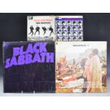 Approximately 50 albums including Status Quo, Black Sabbath, Slade, Deep Purple, Madonna, Mike