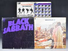 Approximately 50 albums including Status Quo, Black Sabbath, Slade, Deep Purple, Madonna, Mike