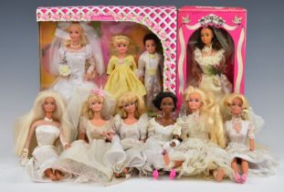 Eight Mattel Barbie dolls in white wedding dresses, two in original boxes.