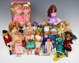 Twenty-four Mattel Barbie dolls in a range of evening dresses, sportswear and vintage Vicky