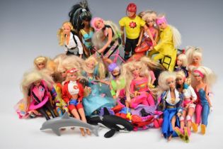 Twenty Mattel Barbie dolls dating mostly to the 1990's together with a range of clothing and