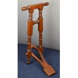 Edwardian mahogany folding / campaign boot jack with inlaid brass plaque for 1911, height 87cm