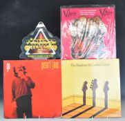 Approximately 100 albums and 12