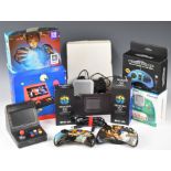 Two mini arcade gaming consoles together with a Super Console X emulator and 7 retro game pads, Mega