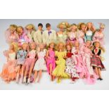 Twenty Mattel Barbie and Ken dolls, mostly dating to the 1980's, with original clothing and