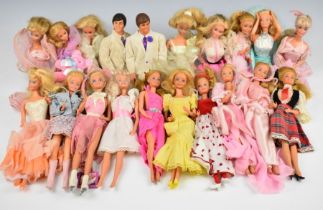 Twenty Mattel Barbie and Ken dolls, mostly dating to the 1980's, with original clothing and