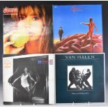 Approximately 50 albums including Magnum, Marillion, Judas Priest, Robert Plant, Queen, UFO, Van