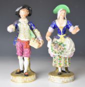 Two 19thC Crown Derby figures carrying flowers and fruit, height 23.5cm
