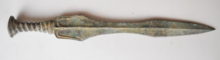Ancient Bronze Age or similar dagger with embossed spiralling handle, 35.3cm long. PLEASE NOTE ALL