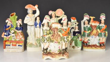 Six 19thC Staffordshire flatback and spill vase figures including The Rocket, tallest 28cm