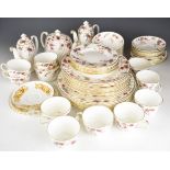 Minton tea and dinner ware decorated in the Ancestral pattern, approximately 64 pieces including