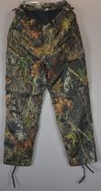 A pair of Stormkloth Real Tree Mossy Oak thermal camouflage trousers, size XL.