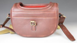 Guardian leather shotgun cartridge bag with canvas shoulder strap.