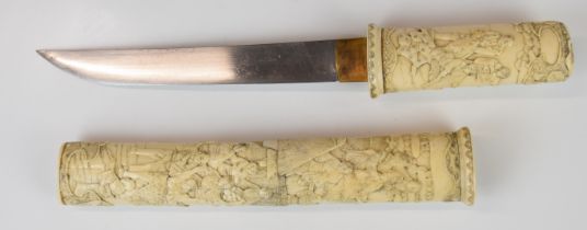 Japanese Meiji period Wakizashi Samurai sword with heavily carved bone handle and scabbard decorated