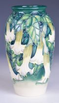 Moorcroft pottery baluster shaped vase by Anji Davenport decorated in the Angels Trumpet pattern,