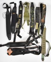 Eight various rifle slings including Remington, Butler Creek etc.