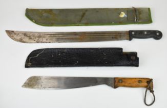 Two machetes comprising a Cold War military example dated 1987 with 33cm blade and a similar example