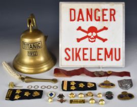 Titanic 1912 replica ship's bell 22cm tall, fixing bracket, danger sign, 27 x 27cm and a quantity of