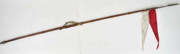 British Army bamboo shaft lance with metal spear point head and shoe and red and white pennon,