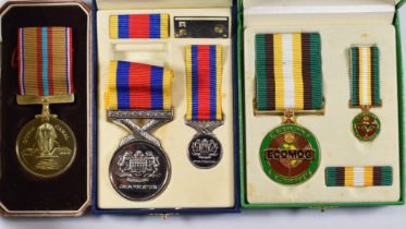 Pingat Jasa Malaysia Medal and miniature, an ECOMOG Medal and miniature and a Suez Canal Medal,