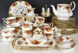Royal Albert tea and dinner ware decorated in the Old Country Roses pattern, approximately ninety