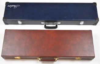 Two shotgun carry cases one Shadow and one with compartments for a shotgun and two sets of