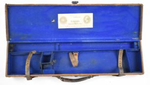 Vintage leather and canvas bound shotgun case with label 'E Fletcher 158 Westgate Street