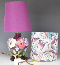 Moorcroft table lamp decorated in the Pansy pattern, with two shades, height 42cm with shade