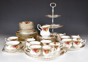 Royal Albert tea and dinner ware decorated in the Old Country Roses pattern, approximately fifty