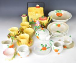 Two Carltonware Art Deco part tea sets, biscuit barrel, dessert set decorated in the oranges