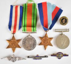 Four British WW2 medals comprising 1939/1945 Star, France & Germany Star, Defence Medal and War