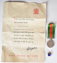 WW2 Home Guard lapel badge and certificate for Hubert Maughan Poskitt 'who served from 25th May 1940