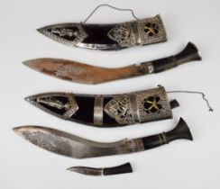 Two Gurkha Kukri knives, both with ornately decorated sheath and inscribed Gurkha Welfare Appeal