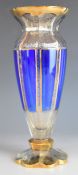 Bohemian style flash overlaid cut glass vase with gilt decoration, 27cm tall.
