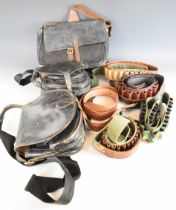 Nine shotgun and rifle cartridge bags and belts including vintage leather examples.