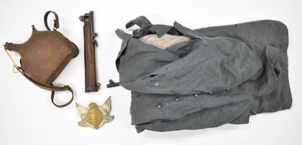 WW1 possibly French greatcoat, water bottle, cap badges, rifle end, postcards etc