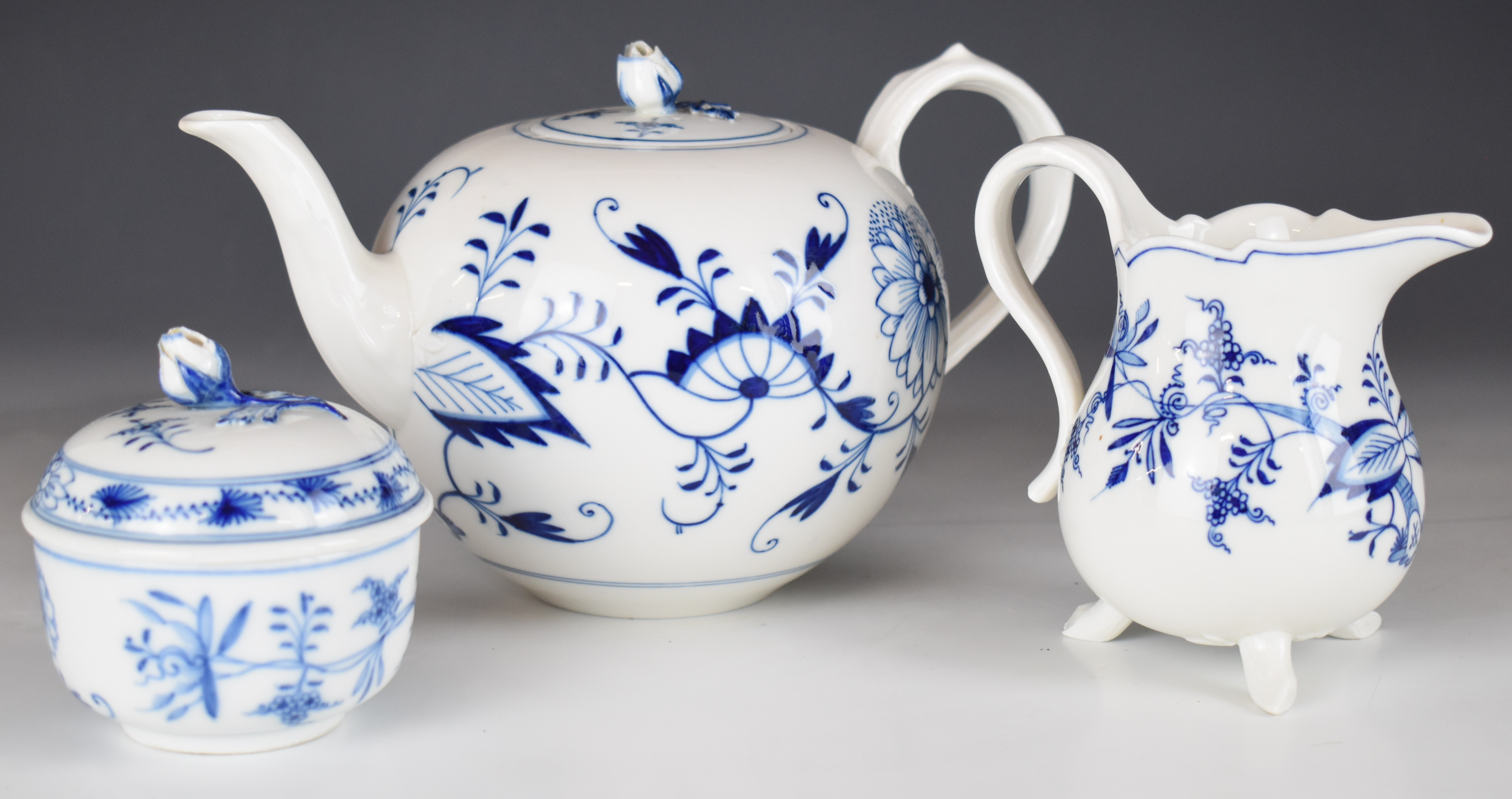 Meissen blue and white porcelain teapot, cream jug and covered sucrier, tallest 20cm