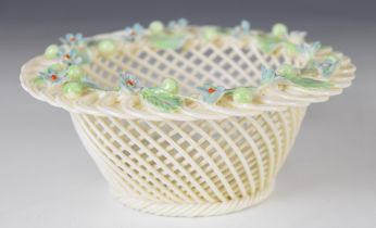 Belleek circular porcelain basket of woven design with applied flower decoration, height 6cm,