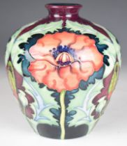 Moorcroft pottery baluster trial vase with large poppy decoration, 1995, height 17.5cm