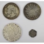 Four replica coins comprising USA Washington $1, Russian rouble, Mexican 8 reales and a Spanish