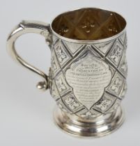 George I hallmarked silver pint tankard with scroll handle, geometric embossed design and