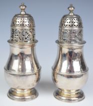 Pair of Queen Anne Britannia standard hallmarked silver sugar casters of baluster form, London 1713,