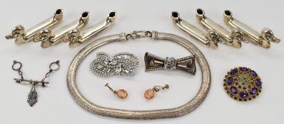 A collection of jewellery including Sphinx brooch, cameo earrings, diamanté brooch, silver necklace,