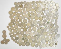 Approximately 1500g pre-1947 silver coinage, including gradable examples, together with a small