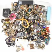 A collection of costume jewellery including Avon necklaces, a pair of 9ct gold earrings, necklaces